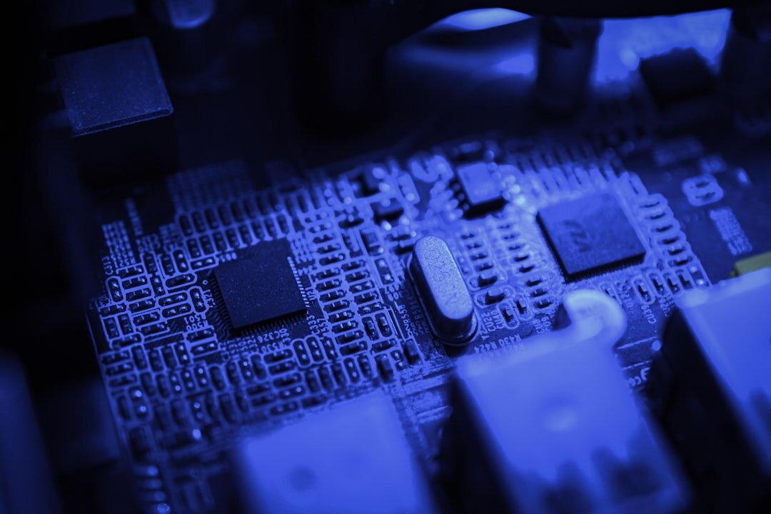 Circuit board with glowing blue LED lights closeup