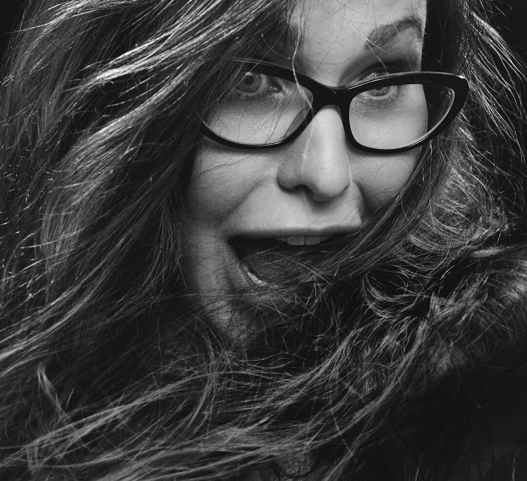 Professional woman with glasses in business attire